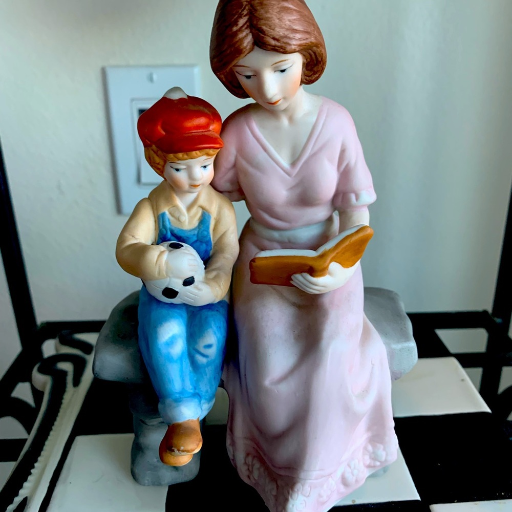 Vintage mom reading to son